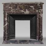 Louis XIV style mantel in Rouge de Rance marble adorned with bronze ornaments