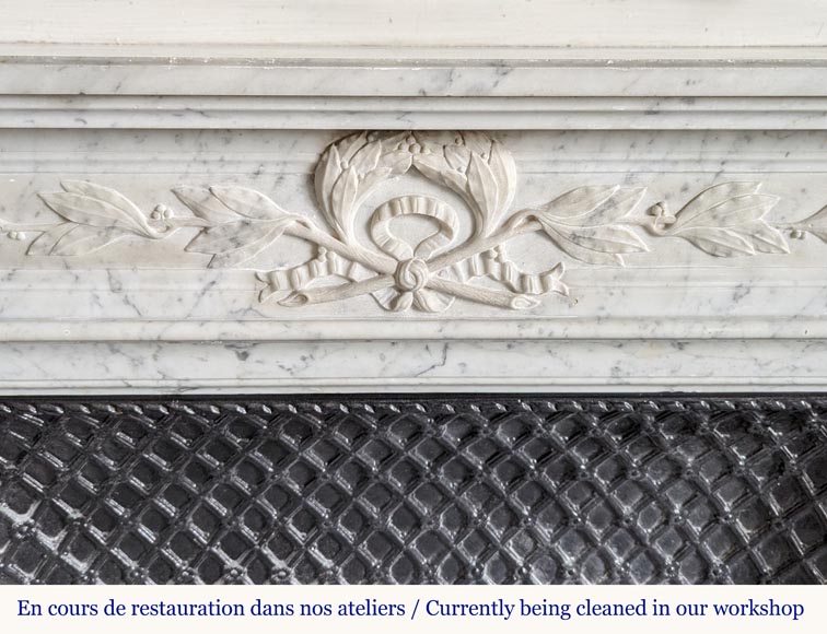 Louis XVI mantel in Carrara marble adorned with a laurel wreath-1