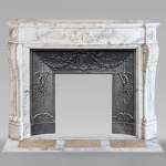 Curved Louis XVI style mantel in Arabescato marble decorated with a laurel wreath