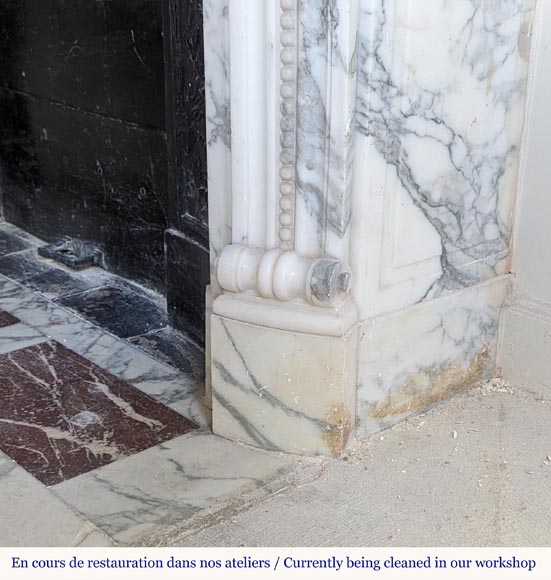 Louis XVI style Arabescato marble mantel with curved entablature decorated with a laurel wreath-10