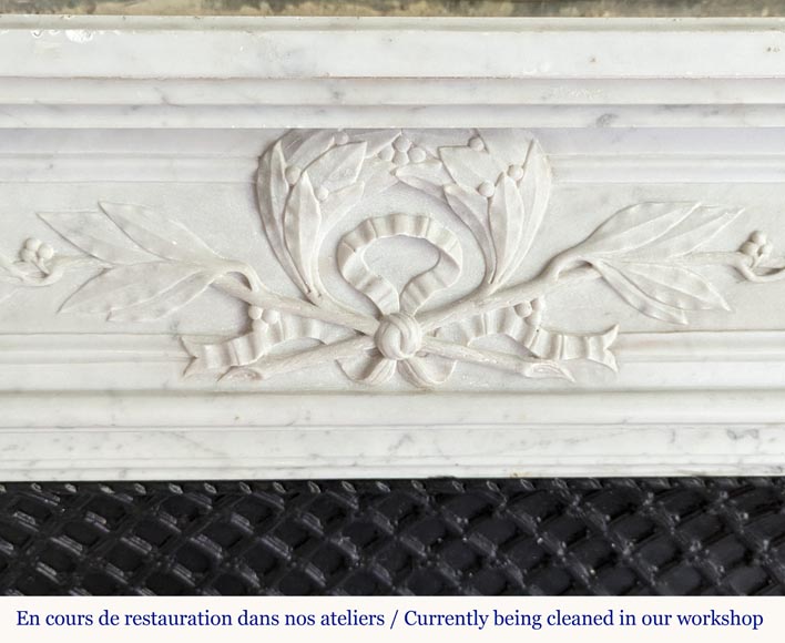 Louis XVI style Carrara marble mantel decorated with a laurel wreath-1