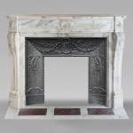 Curved Louis XVI style mantel in Arabescato marble decorated with a laurel wreath