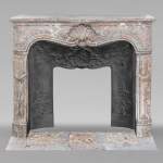 Louis XV style mantel in Red of the North marble with curved shells