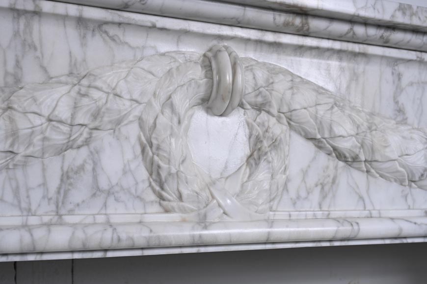 Louis XVI period mantel adorned with a garland carved in antique veined Carrara marble-2