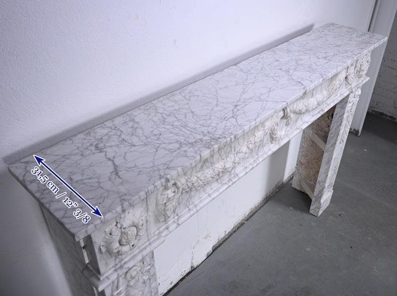 Louis XVI period mantel adorned with a garland carved in antique veined Carrara marble-14