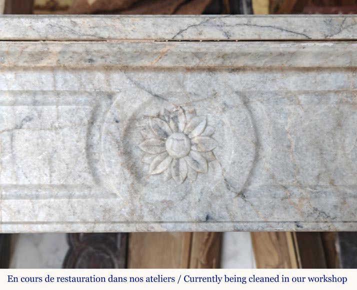 Louis XVI style mantel with rounded corners and carved sunflower in cristaline marble-1