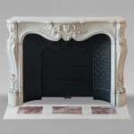 Louis XV style mantel highly carved in Carrara marble