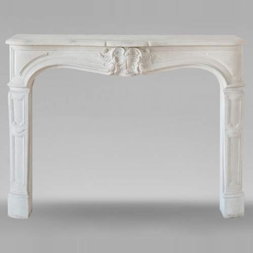 Louis XV style stone mantel with palmette décor