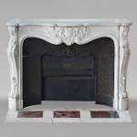 Louis XV style mantel highly carved in Carrara marble