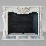 Highly Carved Louis XV-style mantel in Carrara marble