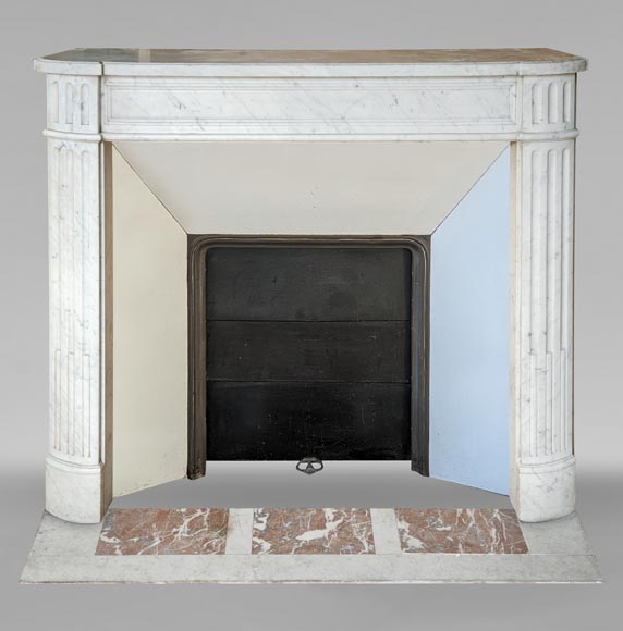 Louis XVI style mantel in veined Carrara marble with fluted legs-0