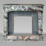 Louis XIV style mantel in banded Campan marble