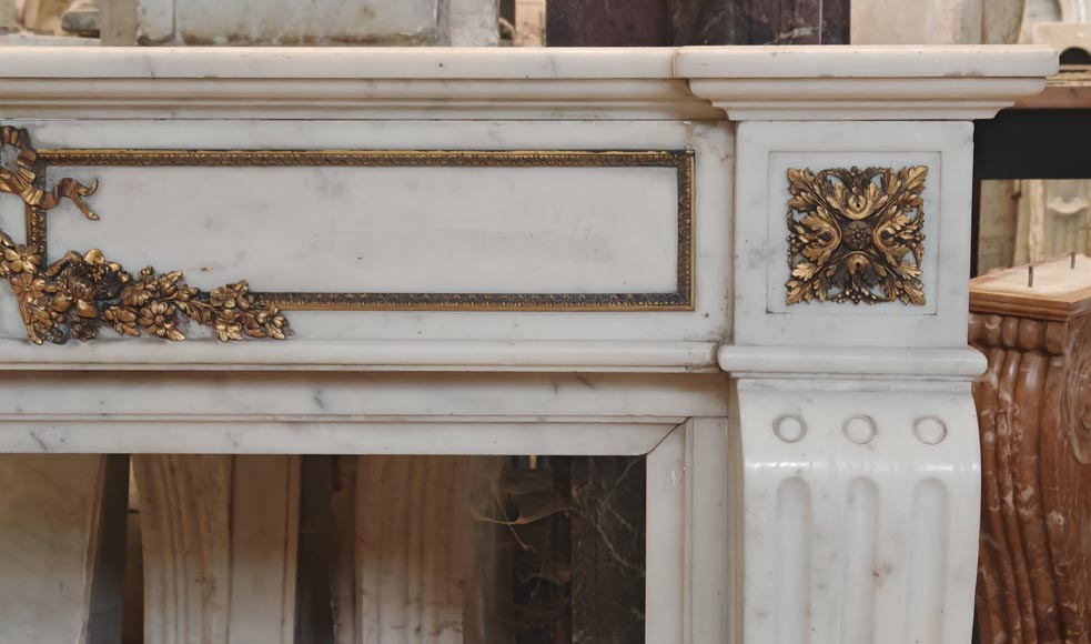 Louis XVI style semi-statuary marble mantel decorated with bronze garlands-8