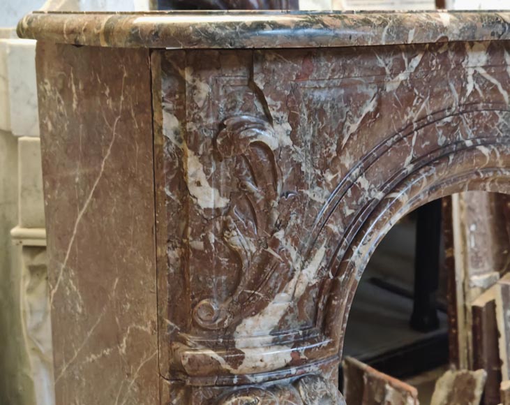 Louis XV style mantel in Rouge Royal marble with asymmetrical shell motif-4