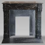 Napoleon III style mantel with modillions carved in black Marquina marble