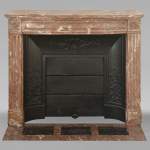 Louis XVI style curved mantel in Northern Red marble