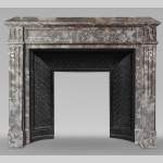 Louis XVI style molded marble mantel in Jourdan wood