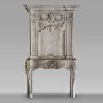 Louis XV period stone mantel with carved overmantel