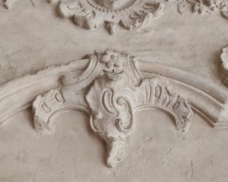 Louis XV period stone mantel with carved overmantel-8