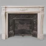 Louis XVI style molded and curved Carrara marble mantel