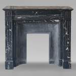 Louis XVI style molded black Marquina marble mantel