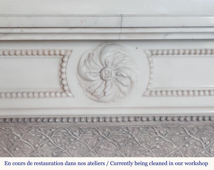 Louis XVI style mantel in semi-statuary marble decorated with a pearl motif-1