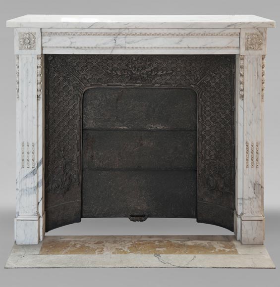 Louis XVI style mantel with pilaster feet carved in veined Carrara marble-0