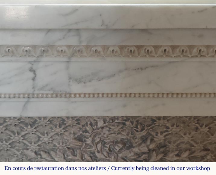 Louis XVI style mantel with pilaster feet carved in veined Carrara marble-1