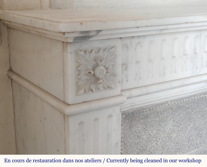 Louis XVI style semi-statuary marble mantel adorned with a frieze of flowers-3