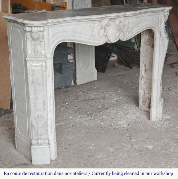 Louis XV style Carrara marble mantel with asymmetrical shell motif-4