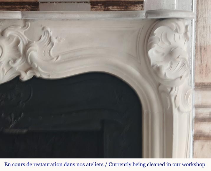 Louis XV style stone mantel with asymmetrical shell design-7